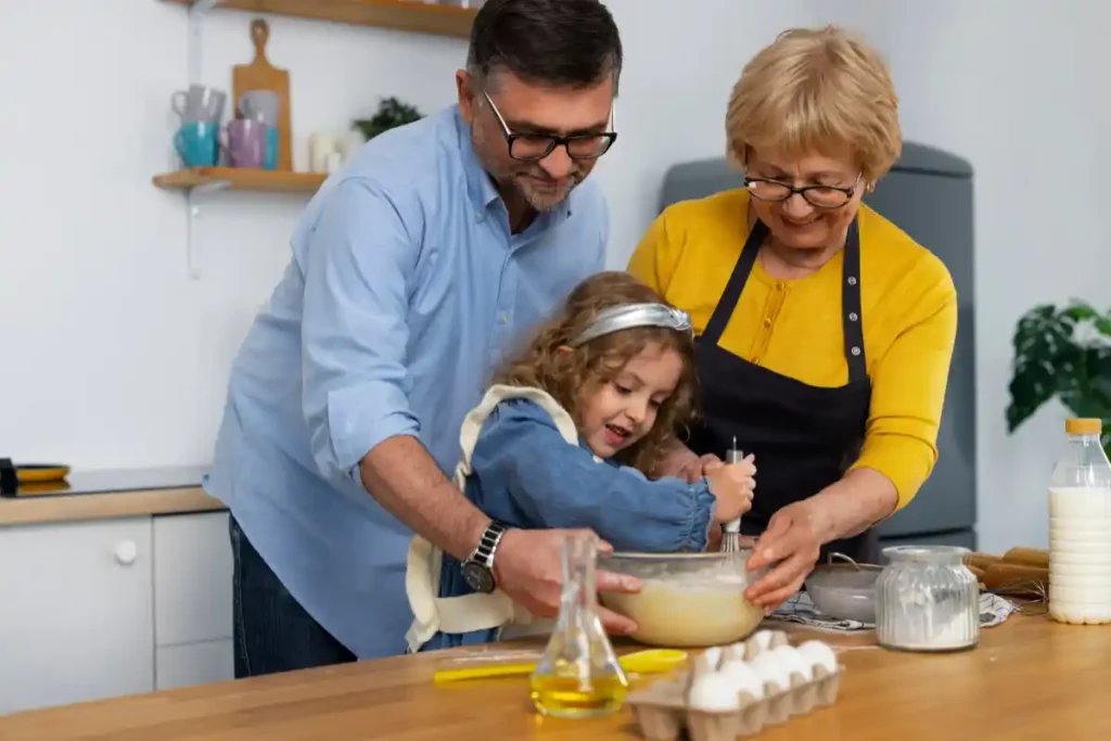 About Me 1 Young Florence cooking with her grandparents in a cozy kitchen