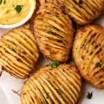 Accordion Potatoes Recipe – Crispy, Easy, and Absolutely Stunning accordion potatoes Accordion potatoes served on rustic wooden platter
