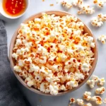 Hot Honey Popcorn Recipe– Sweet & Spicy Snack Favorite hot honey popcorn Step-by-step process of making hot honey popcorn